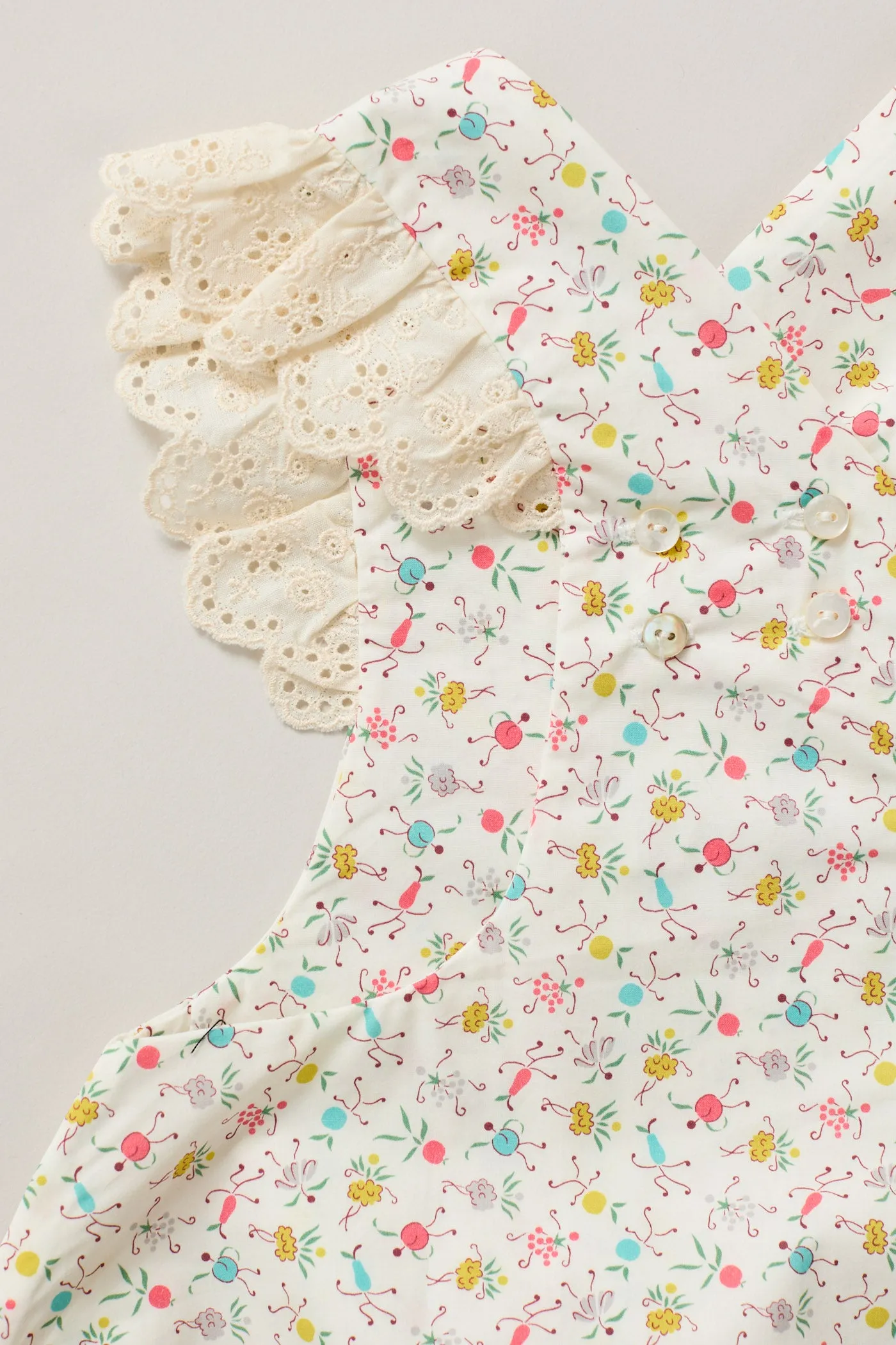 Baby Lace Pinafore in Happy Print