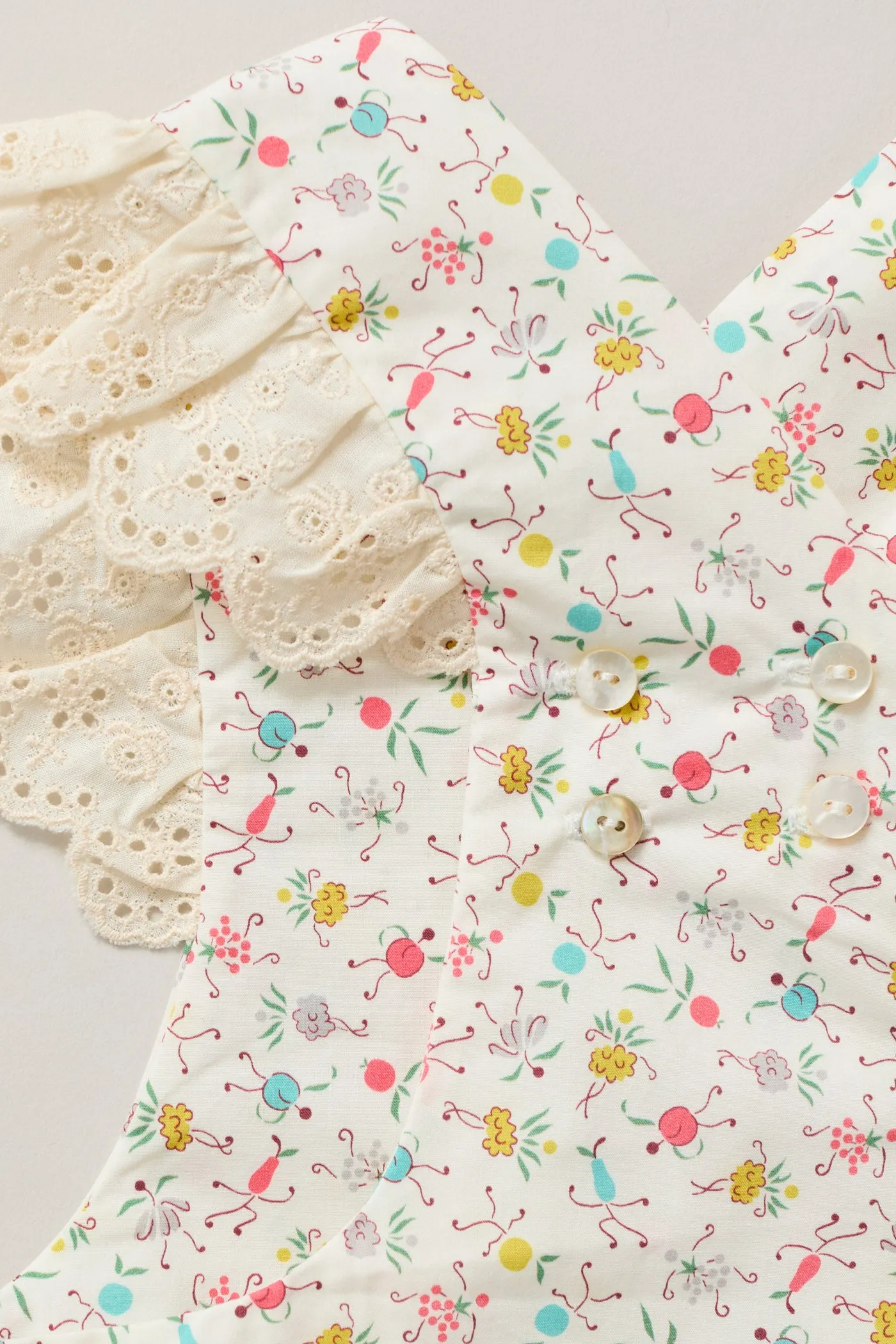 Baby Lace Pinafore in Happy Print