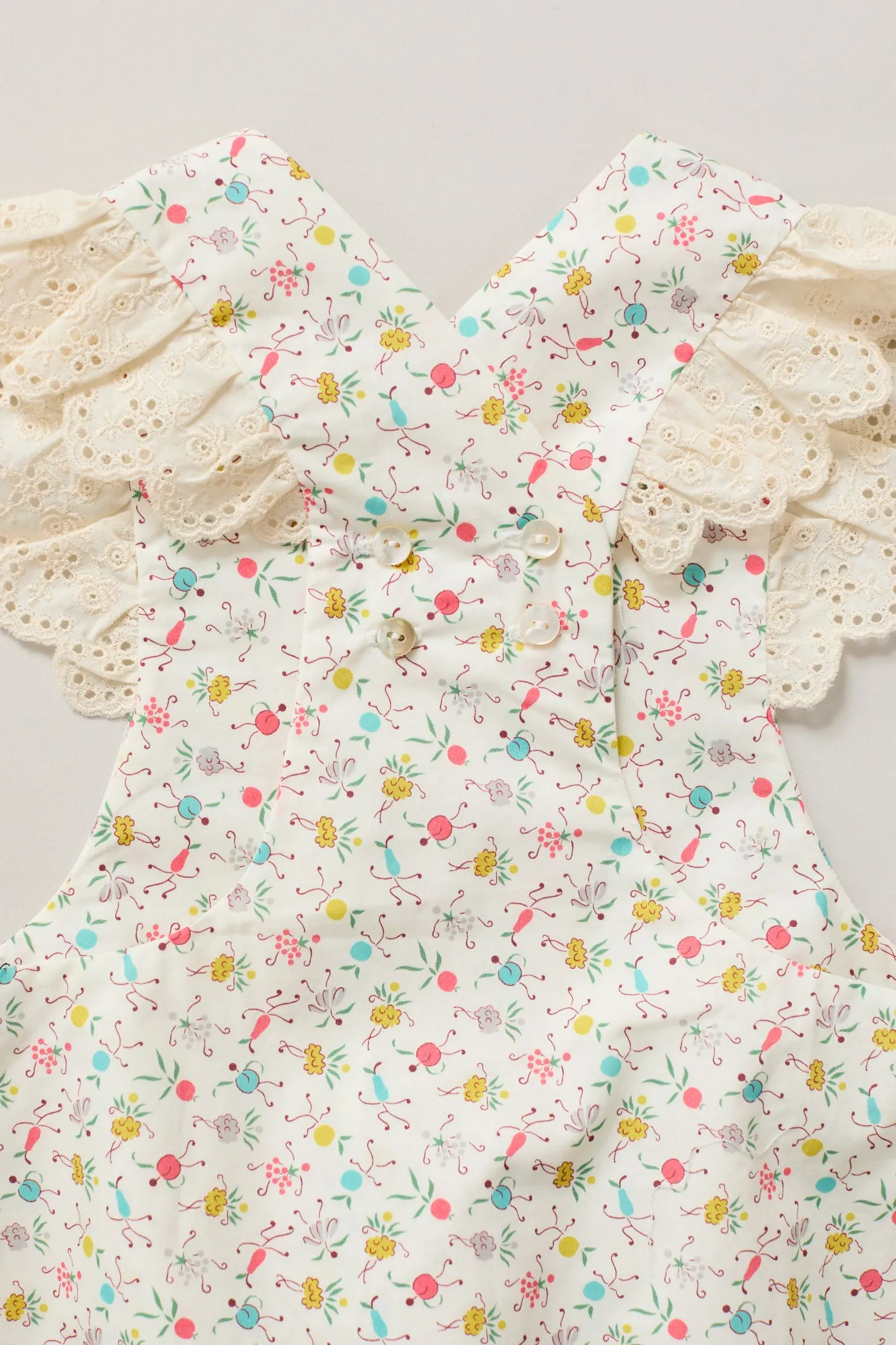 Baby Lace Pinafore in Happy Print