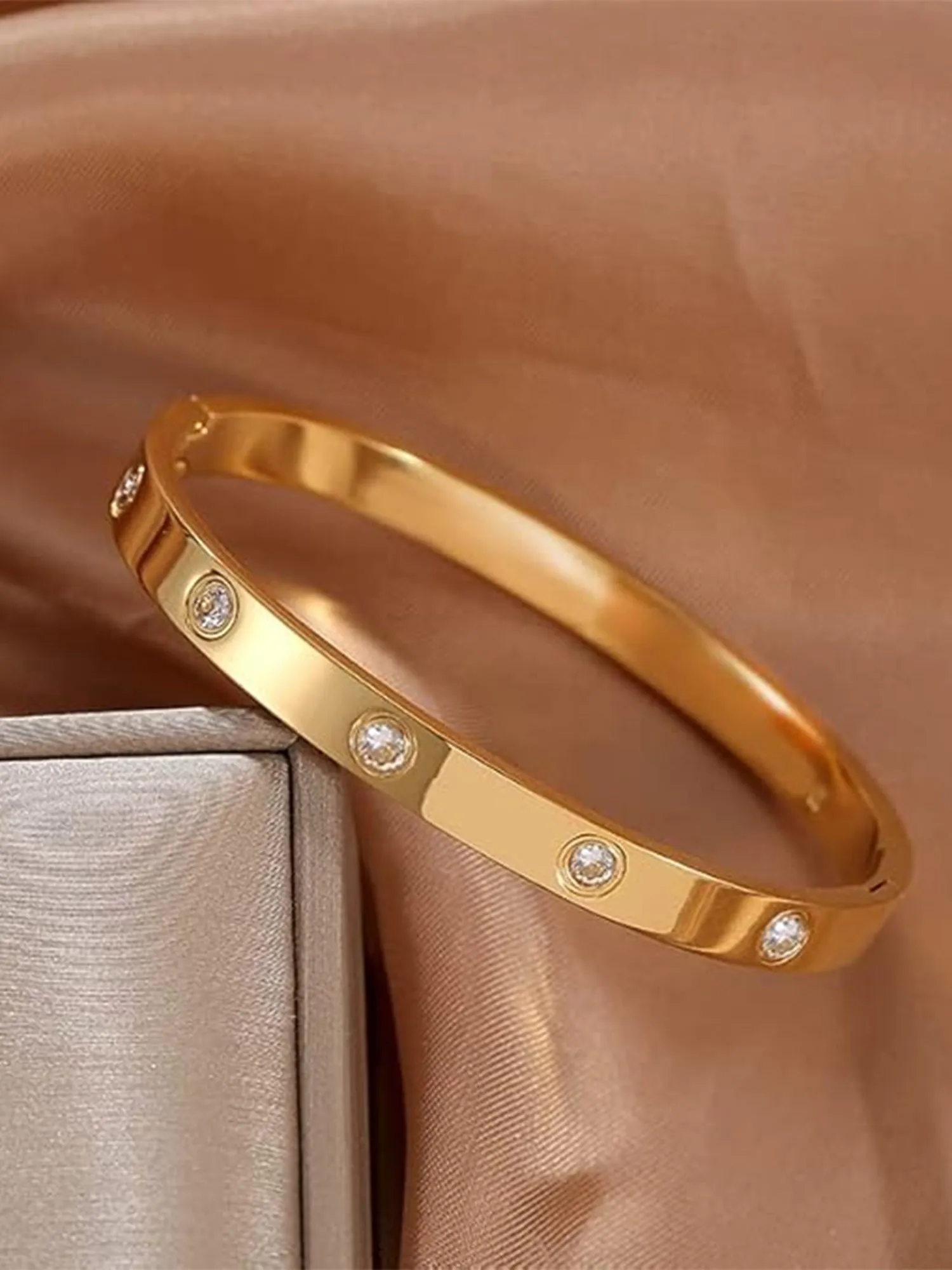 Bohey by KARATCART Gold Plated CZ Stainless Steel Kada Bracelet for Women