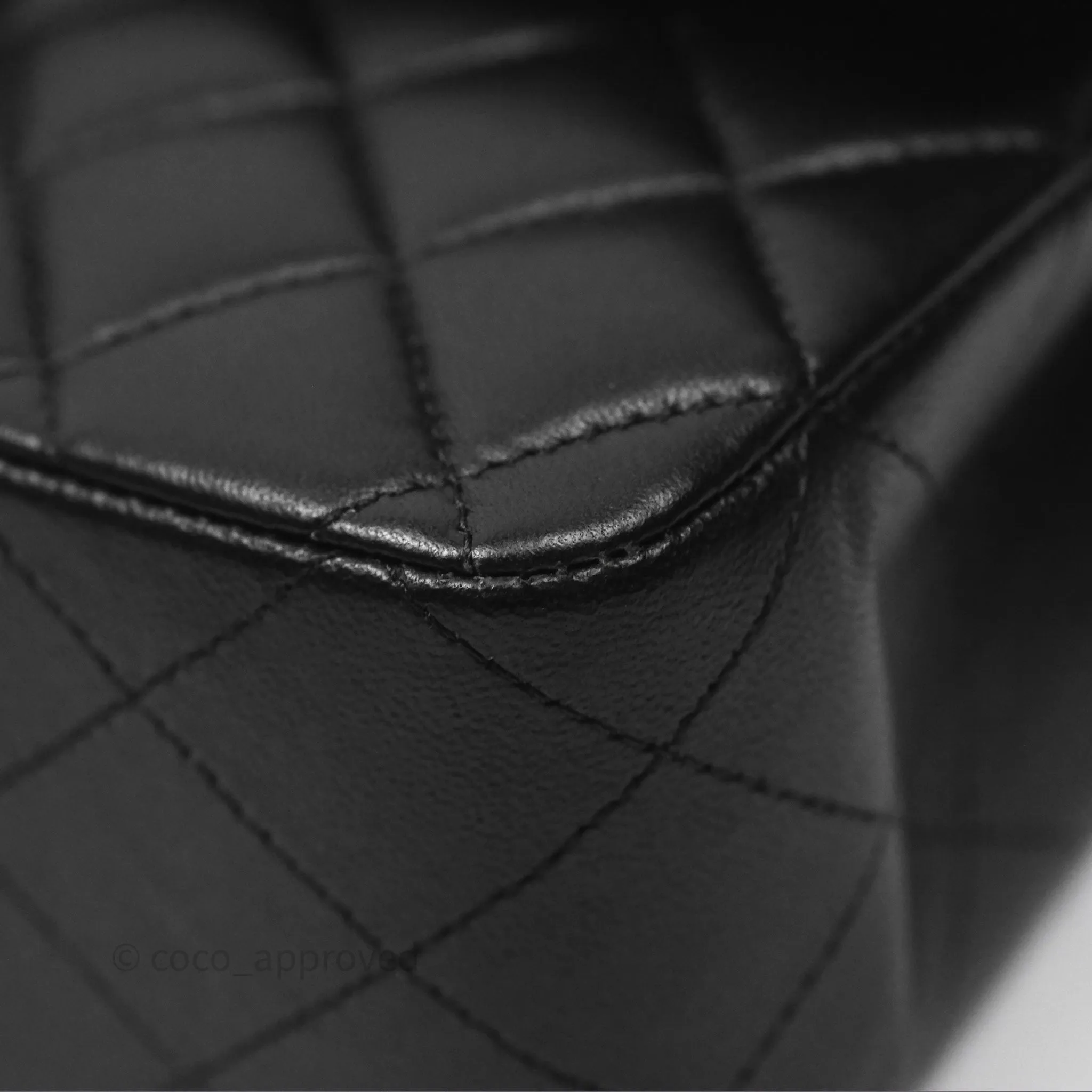 Chanel Classic M/L Medium Flap Quilted Black Lambskin Silver Hardware
