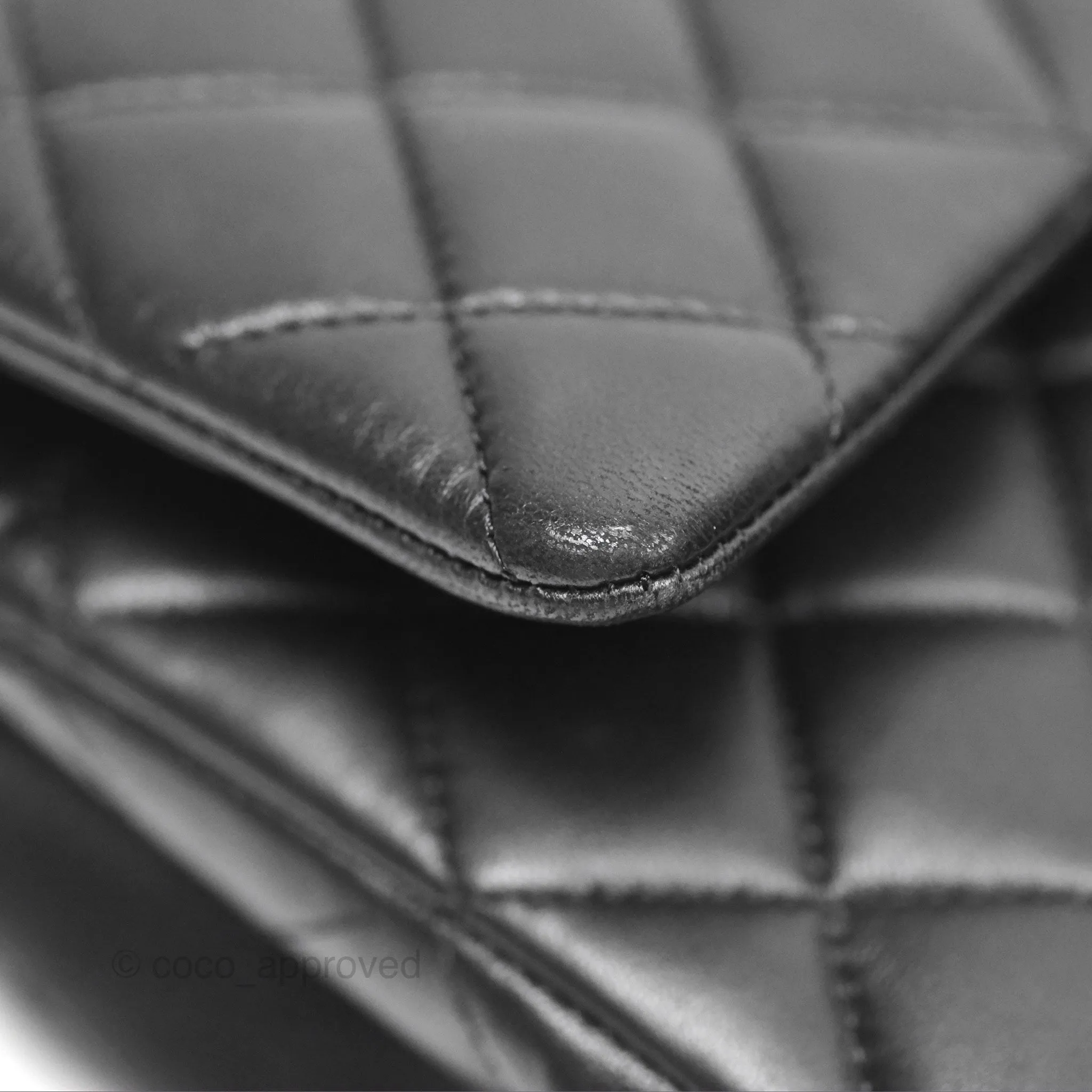 Chanel Classic M/L Medium Flap Quilted Black Lambskin Silver Hardware