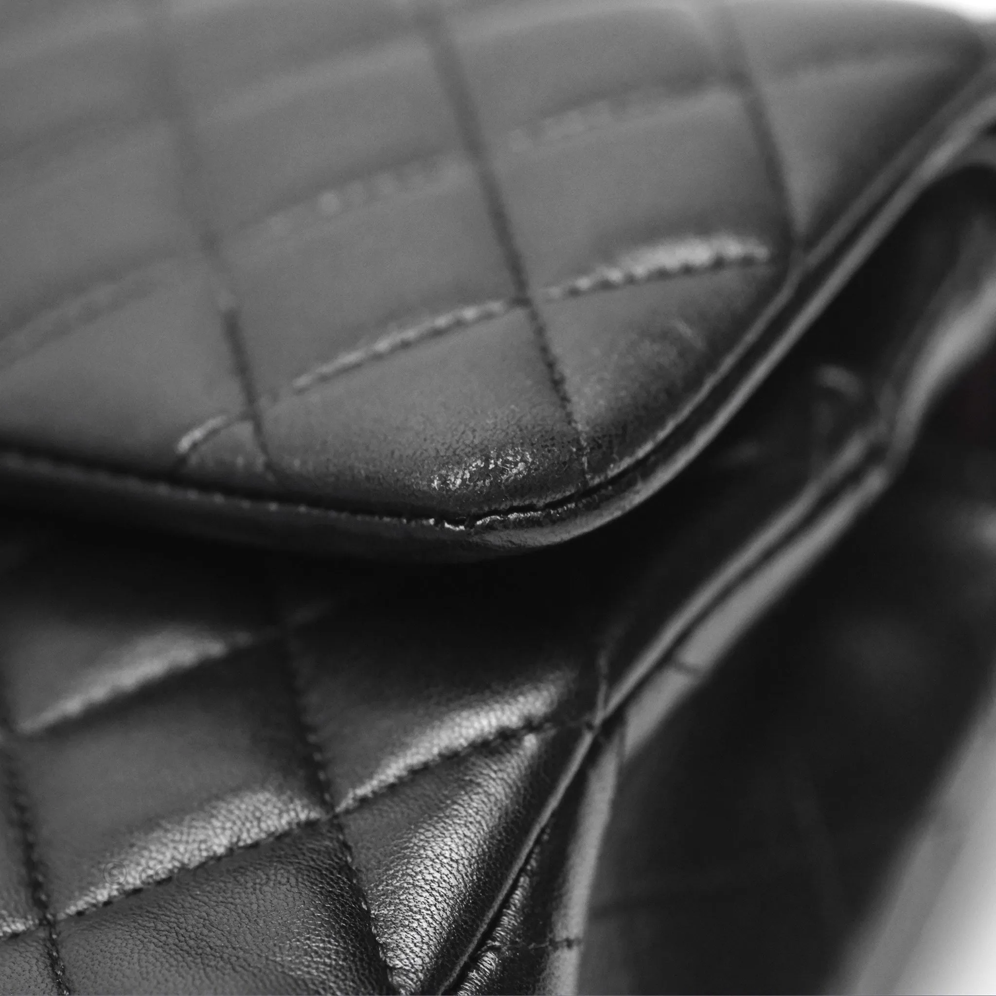 Chanel Classic M/L Medium Flap Quilted Black Lambskin Silver Hardware