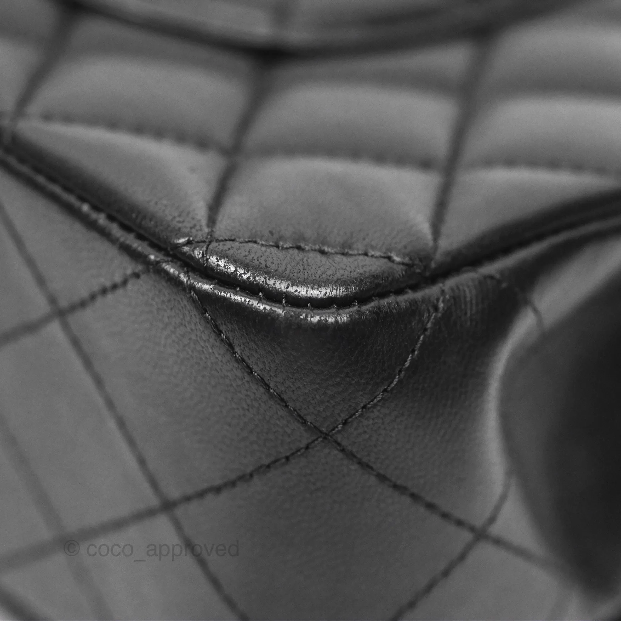 Chanel Classic M/L Medium Flap Quilted Black Lambskin Silver Hardware