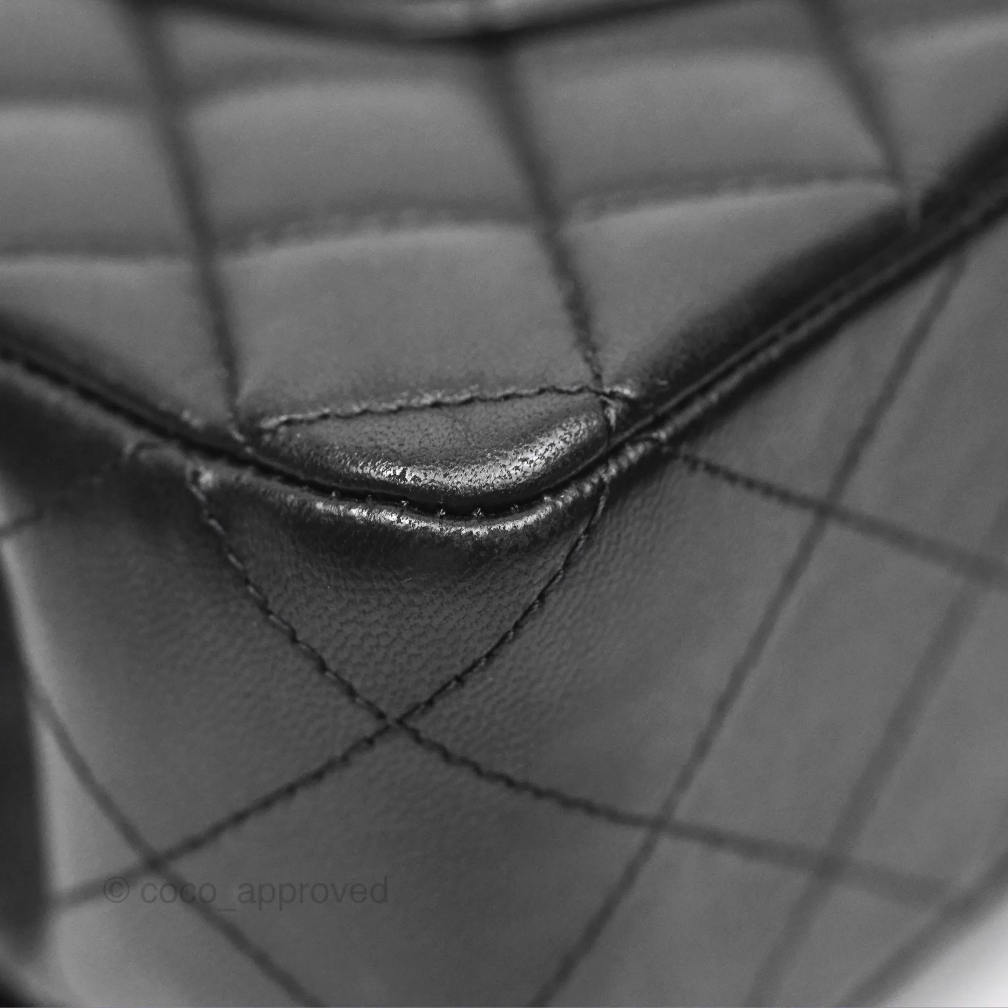 Chanel Classic M/L Medium Flap Quilted Black Lambskin Silver Hardware