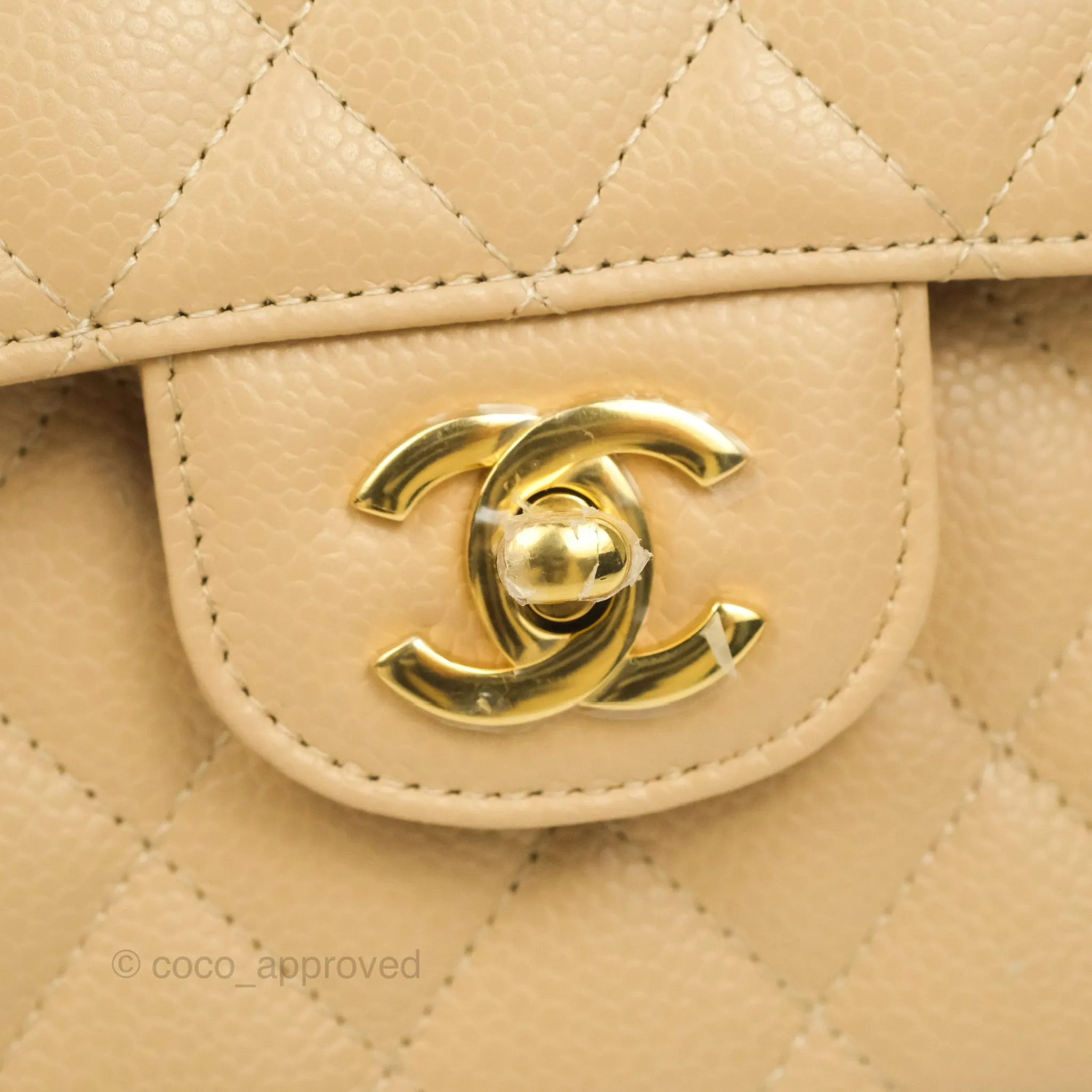 Chanel Classic Small S/M Quilted Flap Beige Caviar Gold Hardware