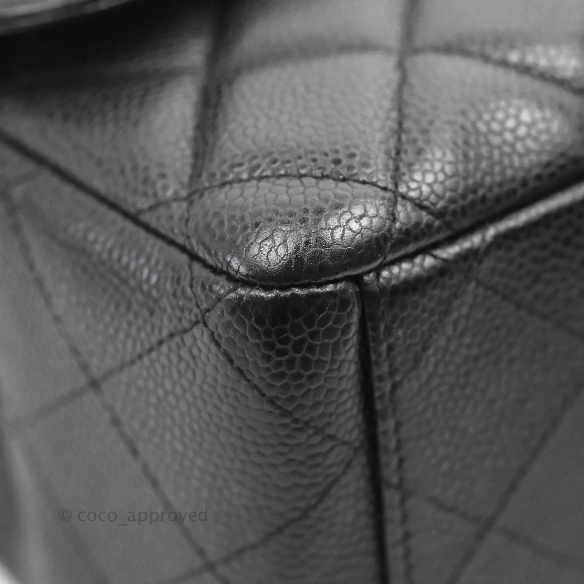 Chanel Quilted Maxi Double Flap Black Caviar Silver Hardware