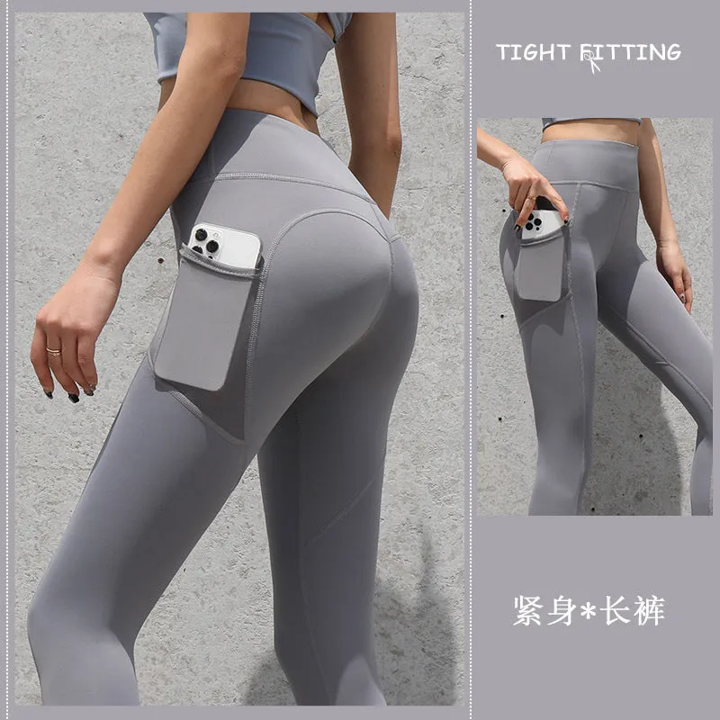 Gym leggings för kvinnor med fickor och sömlös design