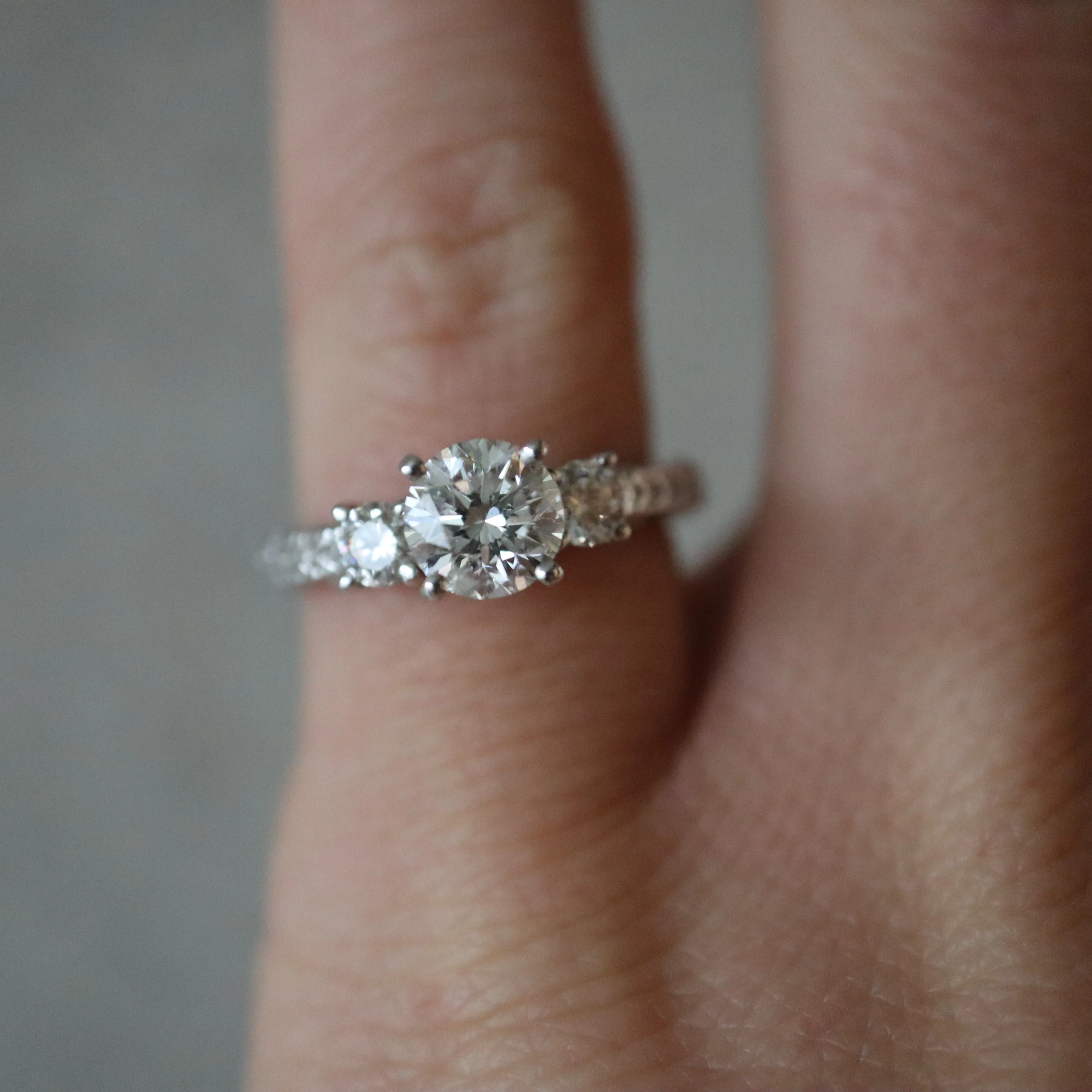 White Gold Engraved Shank and Three Stone Round Diamond Engagement Ring